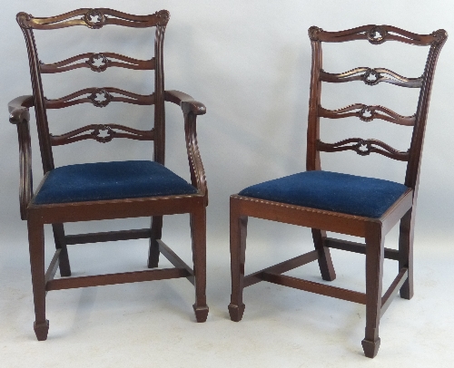 A set of six mahogany dining chairs, including two elbow chairs, Chippendale style with pierced