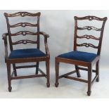 A set of six mahogany dining chairs, including two elbow chairs, Chippendale style with pierced