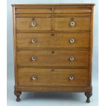 A Victorian mahogany chest, of two short and three long drawers having rounded edged top over two "