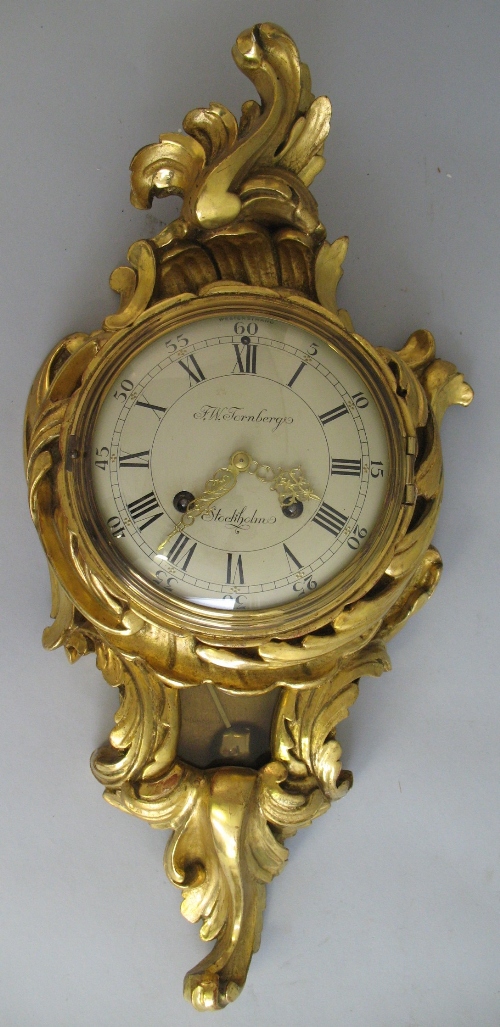 A 20th Century Swedish cartel clock, with eight day movement striking on a bell, the circular dial