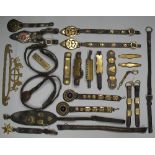 A quantity of brass and leather horse harness, including various lengths of studded straps,