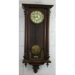 A late 19th Century Vienna style double weight wall clock, having eight day movement striking on a