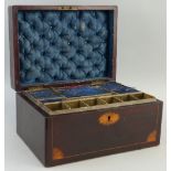 A Victorian mahogany work box, of oblong form, the front and hinged lid inlaid with bat wing