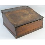 An early 19th Century mahogany writing box, of oblong form with hinged sloping top opening to reveal