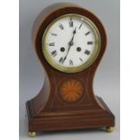 An Edwardian mantel clock, with French brass eight day movement striking on a gong, the white