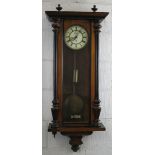 A late 19th Century Vienna style single weight wall clock, having eight day movement, the cream dial