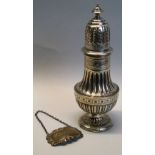A Victorian sugar caster, of baluster form with turned finial on pierced domed lid, fluted, reeded
