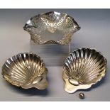 A bon bon dish, of hexagonal form with pierced fluted rim, 14cm wide, Sheffield 1963 and a pair of