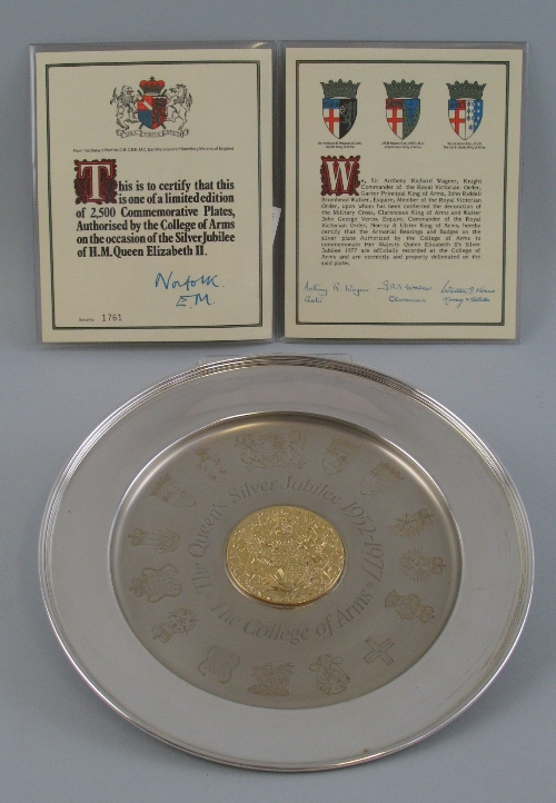 An Elizabeth II Silver Jubilee commemorative plate, of circular form with raised rim, the dished