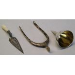 A Victorian miniature funnel, the plain goblet shaped bowl with gilded interior and tapering outlet,