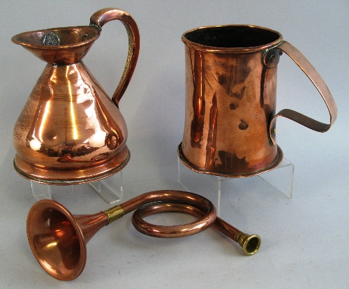 A Victorian seamed copper tankard, with strap work handle, 14cm high, a copper one pint harvest