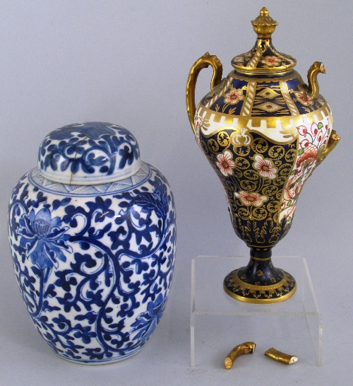 A Chinese ginger jar and cover, painted all over in blue and white with stylised flowerheads and