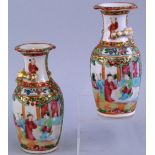 A pair of Cantonese vases, each of baluster form with applied salamander to the neck, enamelled with