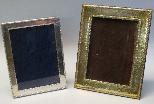 A photograph frame, having oblong aperture with beaten surround and rope twist borders on strut