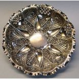 A Victorian sweetmeat dish, of shaped circular form with crinkle rim, pierced panels to the sides