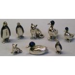 A graduated set of three 925 silver and niello miniature figures of penguins, largest 4cm high,