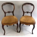 A set of six Victorian walnut salon chairs, stamped and labelled John Eastern and Son Hull, each