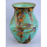 A Fieldings Crown Devon Mattita vase, of bulbous form, enamelled and gilded with birds in flight