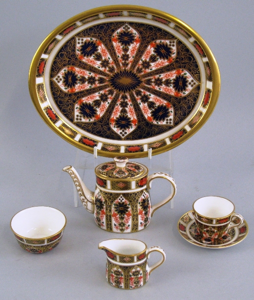 A Royal Crown Derby miniature cabaret set, in the Imari pattern number 1128, comprising an oval