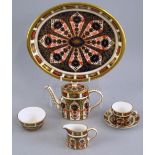 A Royal Crown Derby miniature cabaret set, in the Imari pattern number 1128, comprising an oval