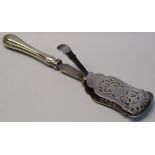 A Canadian sterling silver handled pair of asparagus servers, the waisted handle with thumb operated