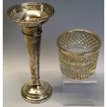 A specimen vase, of tapering form with pierced trumpet rim and stepped circular base with