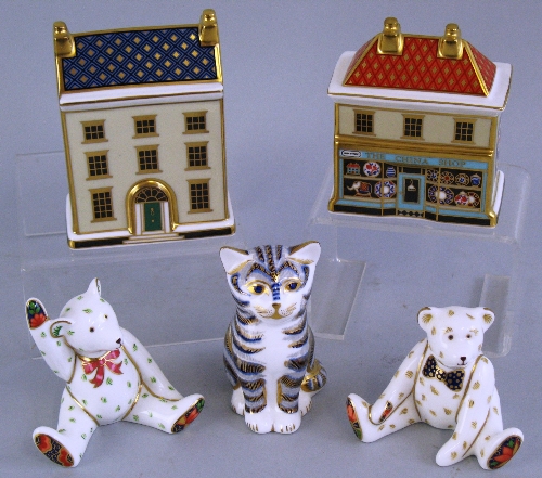 A Royal Crown Derby paperweight, "Grey Kitten" 8.5cm high and four Royal Crown Derby miniatures, "