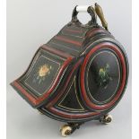 A Victorian toleware coal box, painted with floral panels and red and yellow lines, the domed top