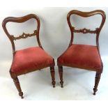 A set of four Victorian mahogany dining chairs, each with open balloon back, dished crest rail,