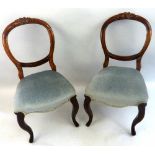 A set of eight salon chairs, the open balloon backs with scroll and acanthus carved crest rail,