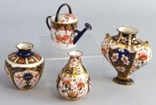 Royal Crown Derby in pattern 1128, three various small vases and a watering can (4)
