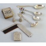 Small collectable items, comb, vesta case, two thimbles, prayer book and four spoons, various dates