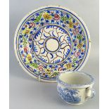 A 19th century pearlware child's chamber pot/vomit bowl, transfer printed in blue and white with a