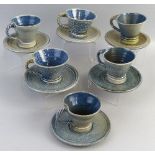 Jane Hamlyn, a matched set of six salt glazed stoneware cups and saucers, each of tapering form with