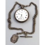 A pocket watch,  the top wind movement with white enamel dial having Roman numerals inscribed