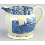 An early 19th century pearlware commemorative jug, of bulbous form transfer printed in blue and