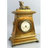 A 19th century brass mantel clock case, with 20th century electric movement the enamel dial with