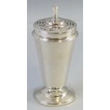 A tall Art Deco style sugar caster, with ornate pierced top, plain tapering circular body on a