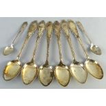 A set of six Norwegian dessert spoons,  the fiddle and thread hafts with scrolling terminals and