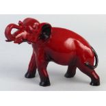 A Royal Doulton Flambe figure, of an elephant modelled standing trumpeting, 13.5cm high