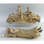 Hilary Brock, a stoneware group as a man seated in a motor car with a lady seated on the bonnet,