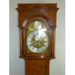 A late 18th/early 19th century longcase clock, the eight-day movement striking on a bell having