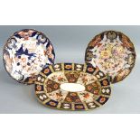 Royal Crown Derby in pattern 1128, small oval meat plate, 27cm and a pair of Derby, 22cm plates in