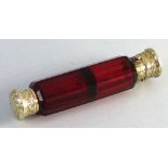 A Victorian ruby glass double ended scent bottle by Sampson Mordan & Co, with hinged and screw