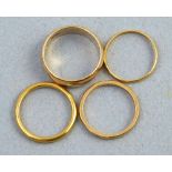A 22ct gold wedding ring, size M 3.2gms, two 9ct gold wedding rings, sizes L and O 6.1gms and