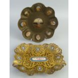 A 19th century continental gilt brass plaque, of circular form with beaded wavy rim the centre