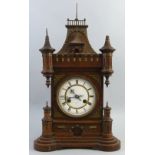 A late 19th century Junghans mantel clock, with brass eight day movement striking on a single gong