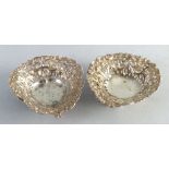 A matched pair of Victorian bon-bon dishes, each of pierced and embossed heart shaped form with