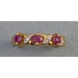 A ruby and diamond ring, comprising three rubies and four diamonds alternating in a straight line on