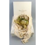 Basia Zarzycka - a bridal bouquet, with metallic, mother-of-pearl style and felt flowers with gilt